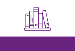 Stack of books on a shelf.