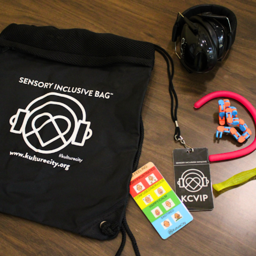 Sensory Inclusive Bag with headphones, mood indication card, and fidget toy.