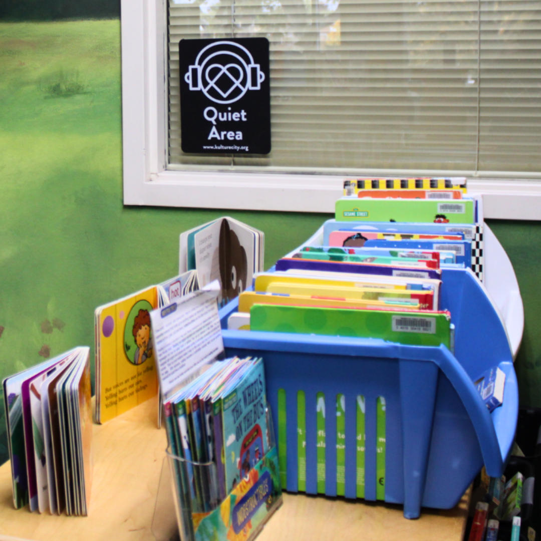 Window of a room with a sign that reads 'quiet area.'