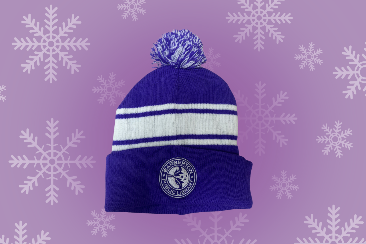 Purple winter beanie hat with the Barberton Library logo sewn on the front.