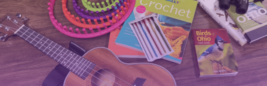 Guitar, knitting supplies, book on birdwatching, and other items.